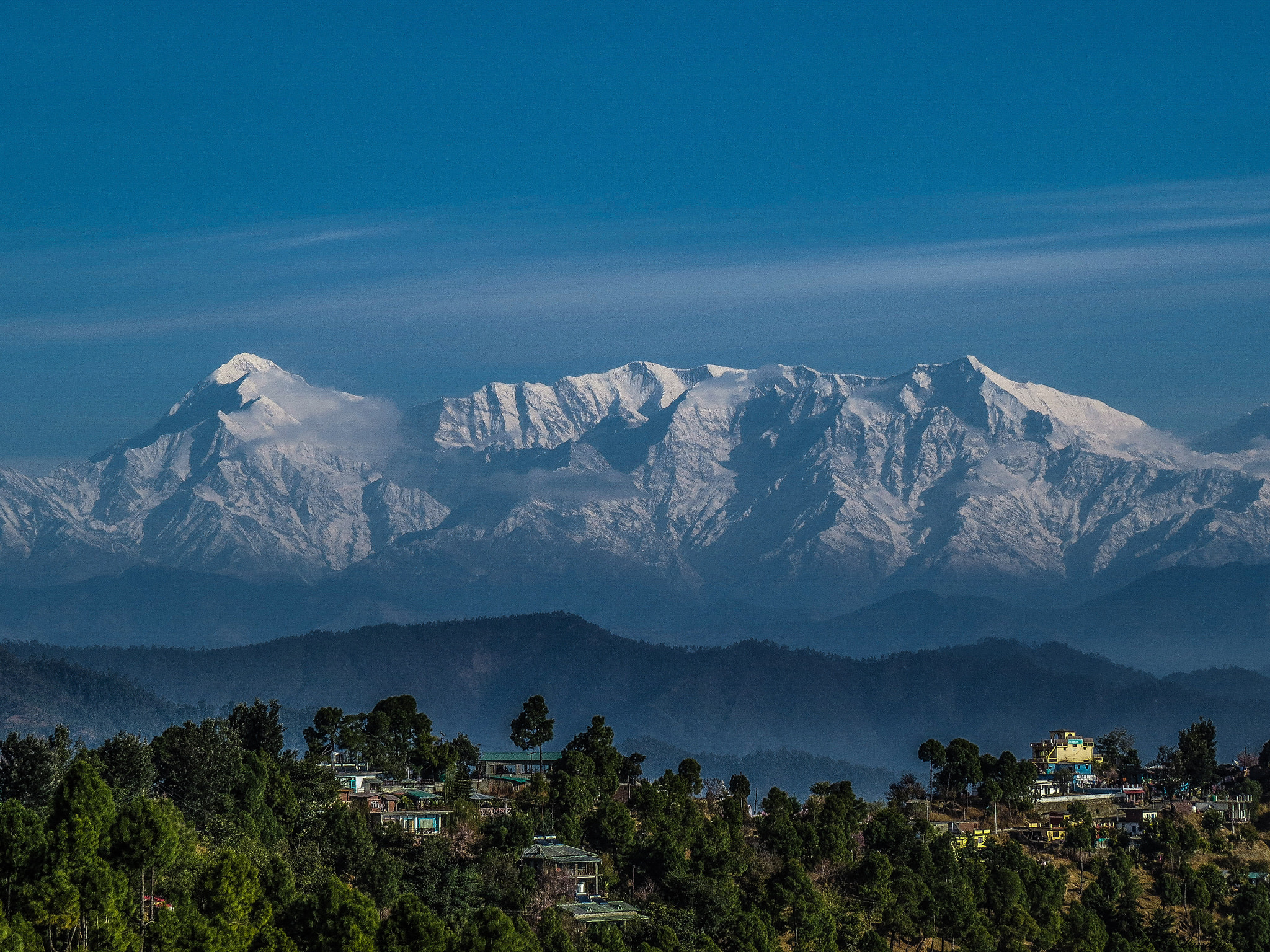 The Moksha Retreat cottages at golden hour, Kasar Devi, Uttarakhand