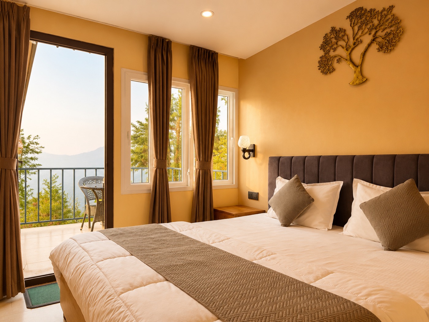 Deluxe Himalaya Facing Cottage — king bed with open balcony and mountain view